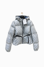“Parfum d’Hiver” Dior Oblique Alpine Puffer — Signature Monogram Winter Jacket