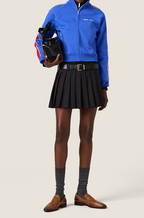 Miu Miu “École Élitaire” Pleated Mini Skirt
