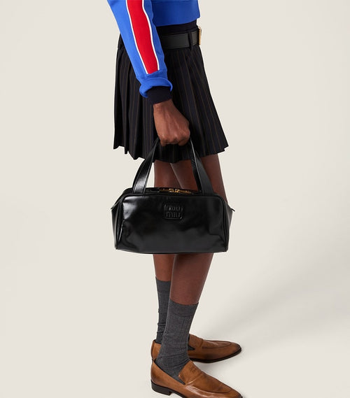 Miu Miu “École Élitaire” Pleated Mini Skirt