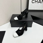 Chanel Épure Slingback Pumps – Noir & Blanc Patent Edition