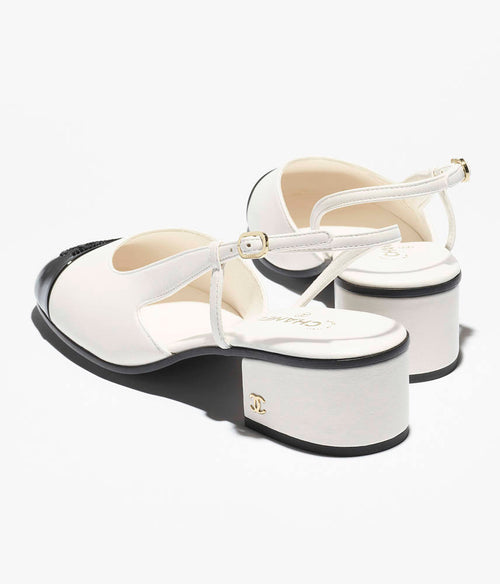 Chanel Épure Slingback Pumps – Blanc & Noir Low Heel Edition