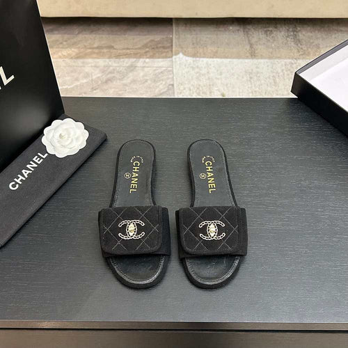 Chanel Quilted Canvas Slides – Noir Classique