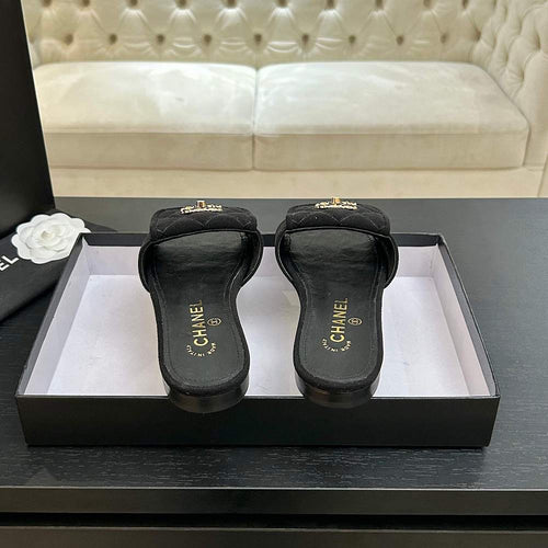 Chanel Quilted Canvas Slides – Noir Classique