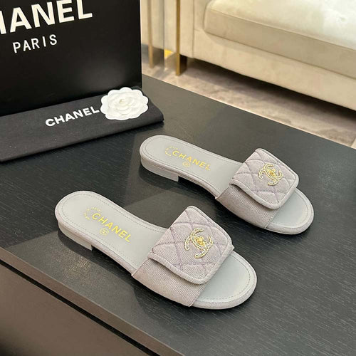 Chanel Quilted Canvas Slides – Sable Élégance