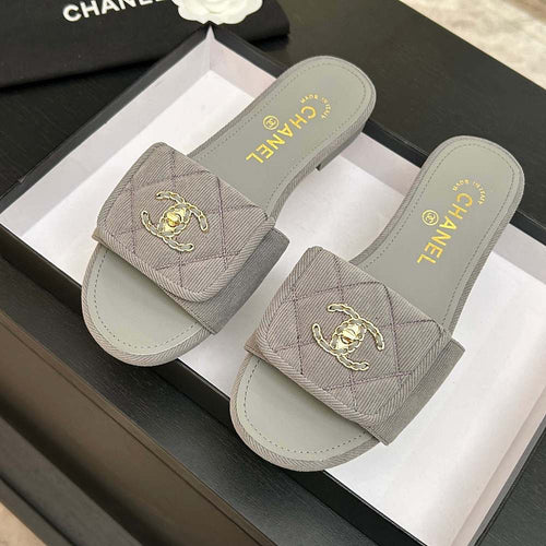 Chanel Quilted Canvas Slides – Sable Élégance