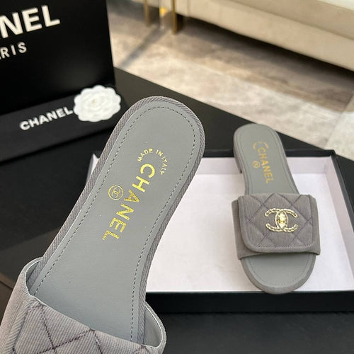 Chanel Quilted Canvas Slides – Sable Élégance