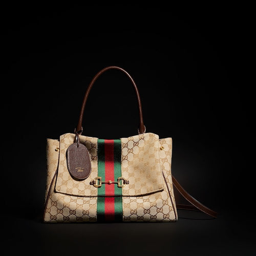 Gucci “Paparazzo” Medium Top Handle Bag