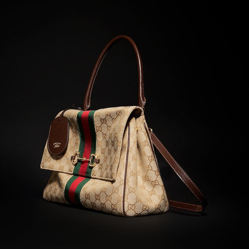 Gucci “Paparazzo” Medium Top Handle Bag