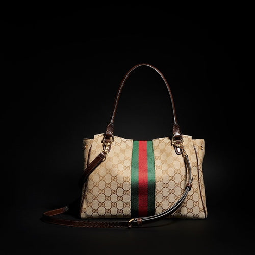 Gucci “Paparazzo” Medium Top Handle Bag