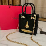 “Visage d’Or” Face Bag by Schiaparelli