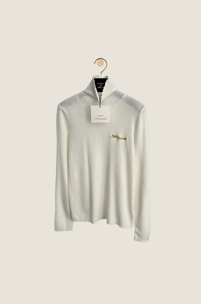 IMG_4727_d3c7a20b-4062-412f-a9a5-a10ea290360c.png Schiaparelli “Écriture Dorée” Signature Knit Mock-Neck Top - Image 1