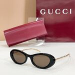 GUCCI Sculpted Oval Metal-Temple Sunglasses