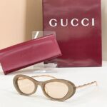 GUCCI Sculpted Oval Metal-Temple Sunglasses