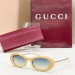 GUCCI Sculpted Oval Metal-Temple Sunglasses