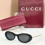 GUCCI Sculpted Oval Metal-Temple Sunglasses