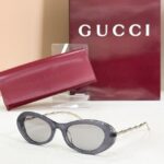 GUCCI Sculpted Oval Metal-Temple Sunglasses